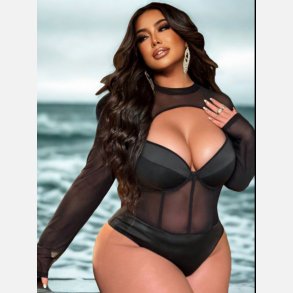 Bodystocking i sort med �ben foran og lange �rmer. 
