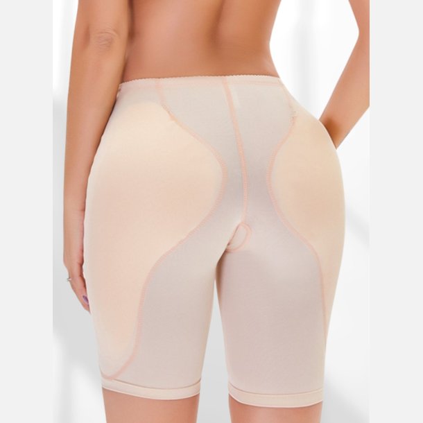 Bestseller! Hofte/Balle trusse . Lang model med virkelig flot og naturlig god fylde. Strammer ind foran. Nude . Str. M-2XL