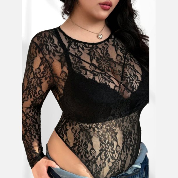 Bodystocking i sort bl�d blonde. Str�kker sig