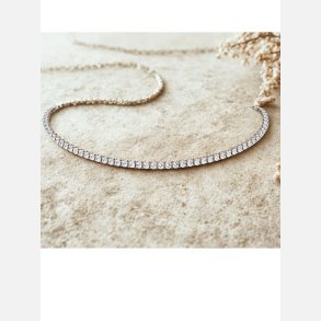 Halsk�de. Super fin i guldfarvet med similisten. One size