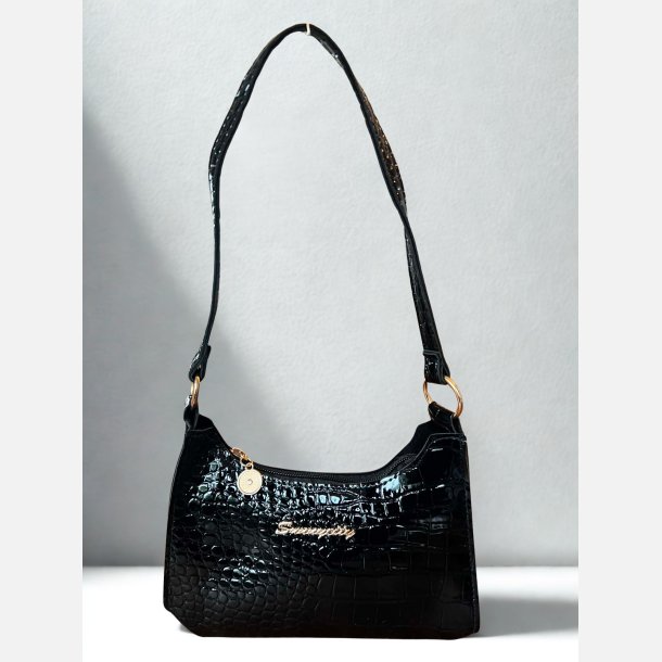 Taske. Lille h�ndtaske til at g� i byen med. Sort krokodillelook. H: 15 cm. L: 21 cm