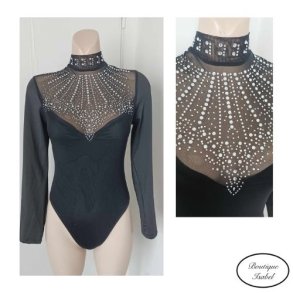 Bodystocking i sort med lange �rmer og masser af similisten. Medium