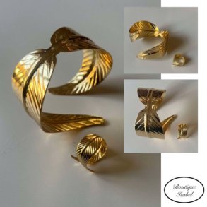 Armb�nd og ring formet som et blad i guldlook. Reguleres efter din st�rrelse. S�t.