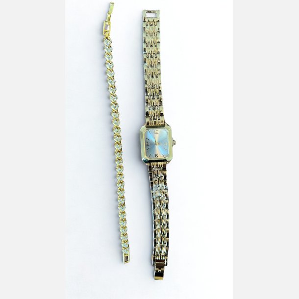 Guldur med fint armb�nd med similisten. L: 18 cm